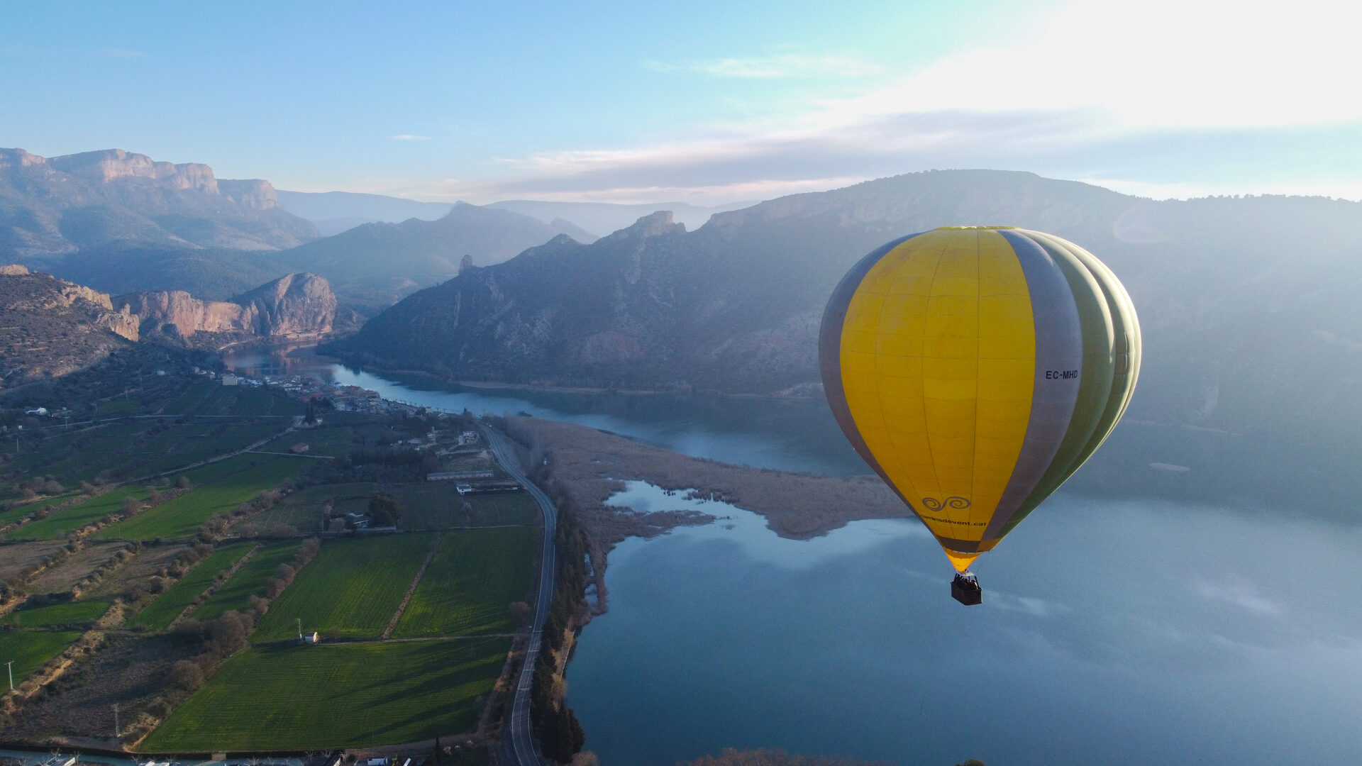 Aerial drone view of hot air balloon over Catalan countryside